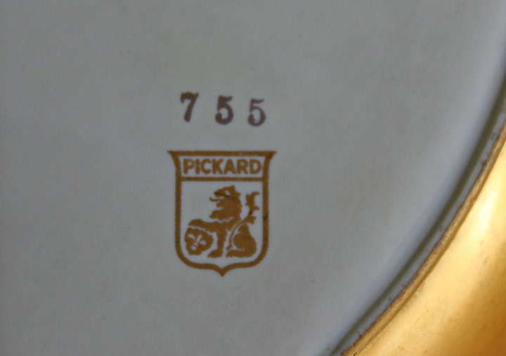 Close-up of the hallmark on Pickard Divided Bowl with Embossed Rose and Daisy Pattern Over 24 Karat Gold.