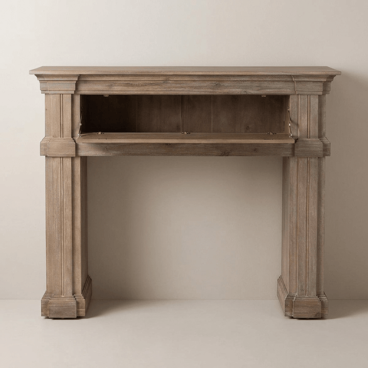 Driftwood decorative mantel with its drop-front panel open to reveal the concealed storage compartment.
