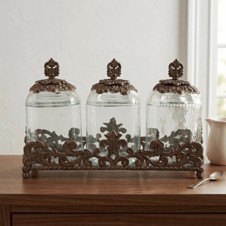 Bellavita glass canister trio in its decorative metal base on a wooden sideboard