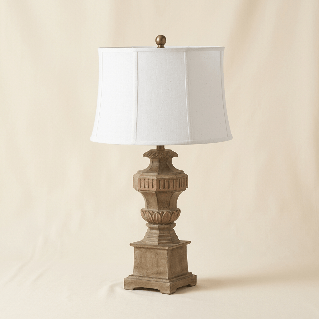 Evangeline classical table lamp with linen shade on an off-white studio background