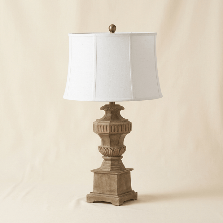 Evangeline classical table lamp with linen shade on an off-white studio background