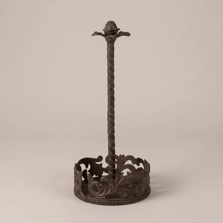 Bellavita Paper Towel Holder showing the twisted post and botanical finial against taupe.
