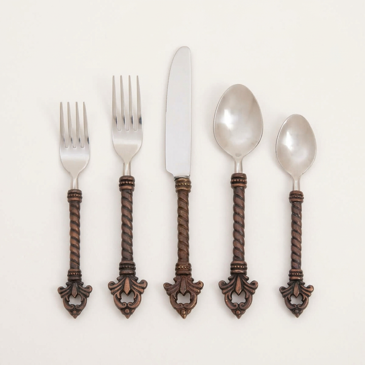 Five-piece Bellavita flatware place setting with twisted dark brown handles on a warm white background.