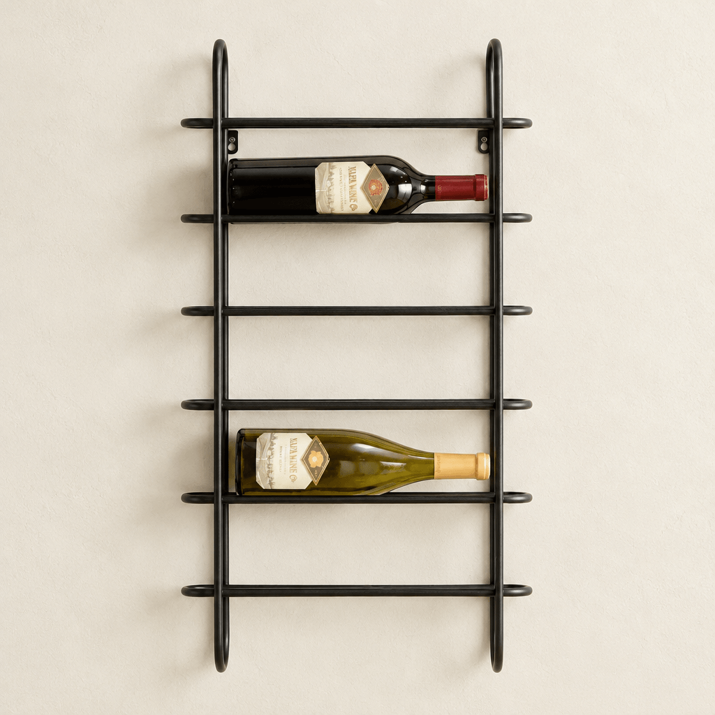 Black iron six-bottle wall wine rack mounted on an ivory wall with two wine bottles.