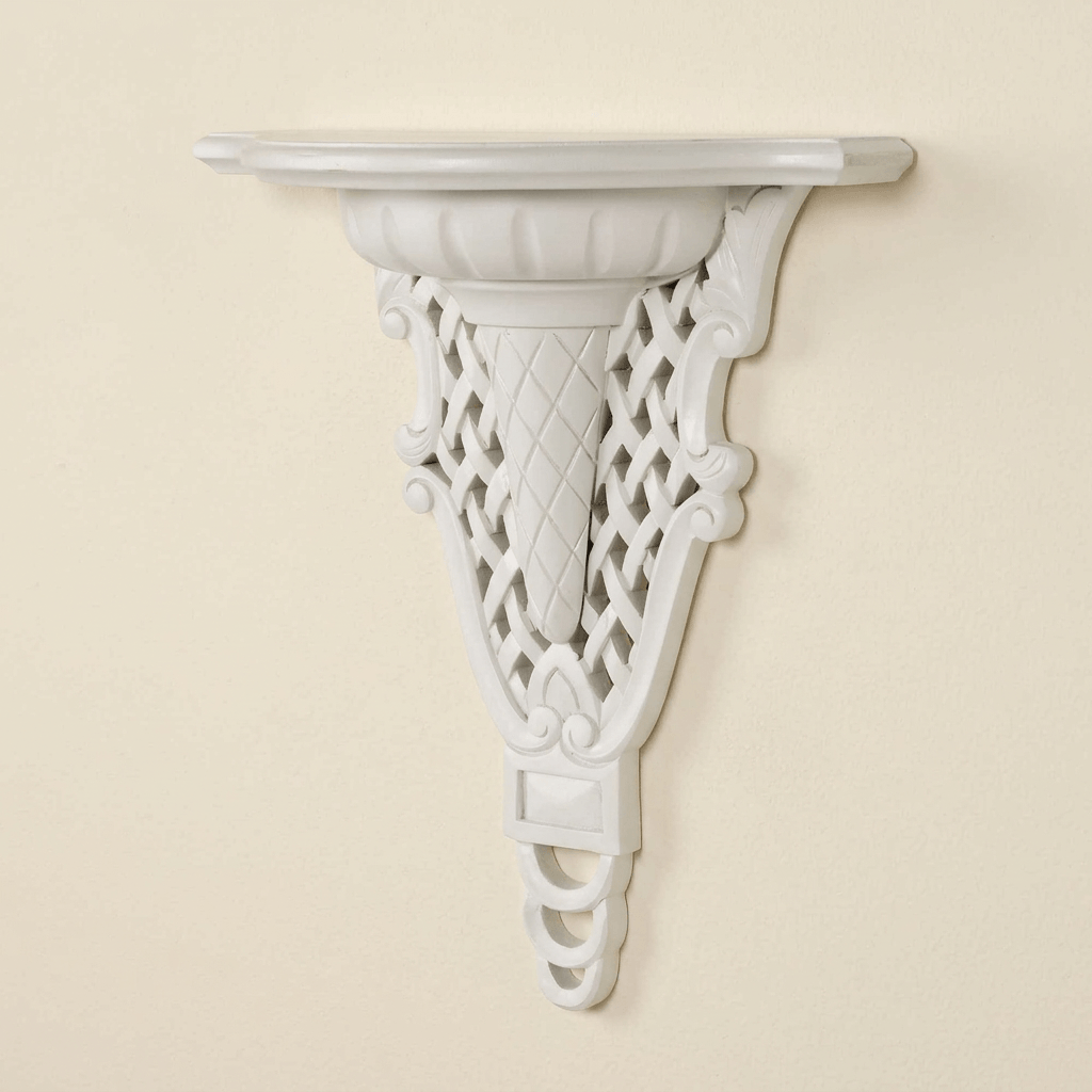 White Avelisse Wall Ledge with carved latticework and scrolling support against an ivory wall.