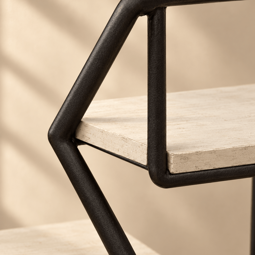 Close-up of the black iron frame and pale wooden shelf construction