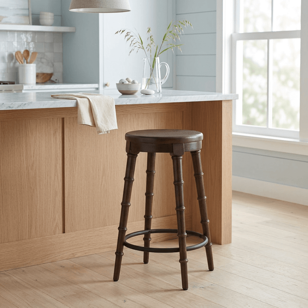 Spindrift Counter Stool in the Truffle finish beside a kitchen island in a bright coastal kitchen