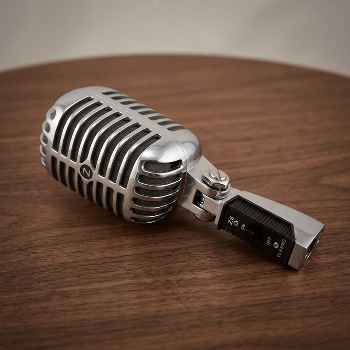 Silver Z6 retro microphone unit photographed on a dark walnut tabletop.