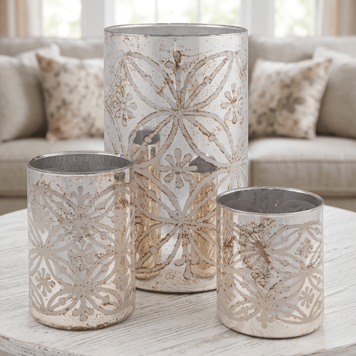 Etched Floral Mercury Glass Candle Holders (Set of 3) as a centerpiece on a whitewashed coffee table