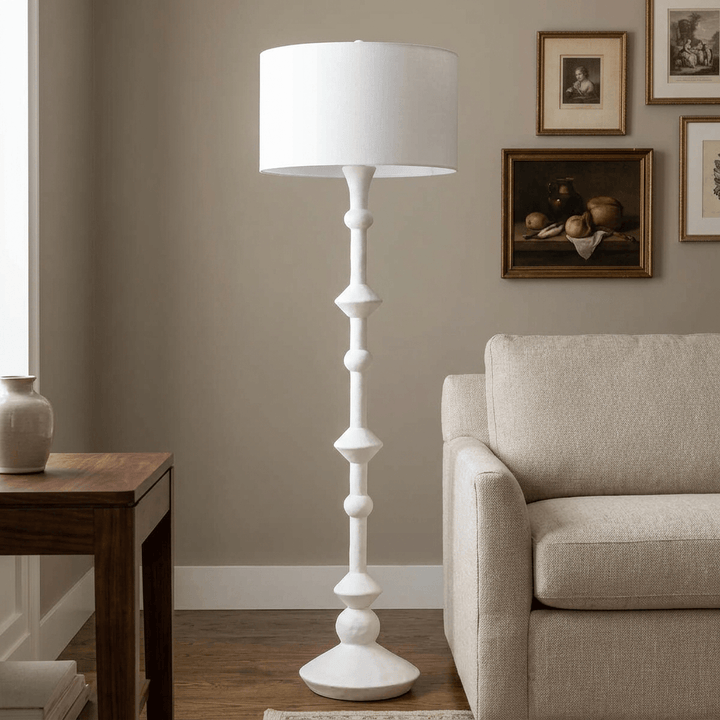 Elara white floor lamp in a traditional living room, square lifestyle image