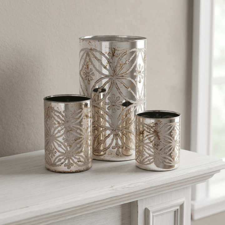 Etched Floral Mercury Glass Candle Holders (Set of 3) on a white fireplace mantel