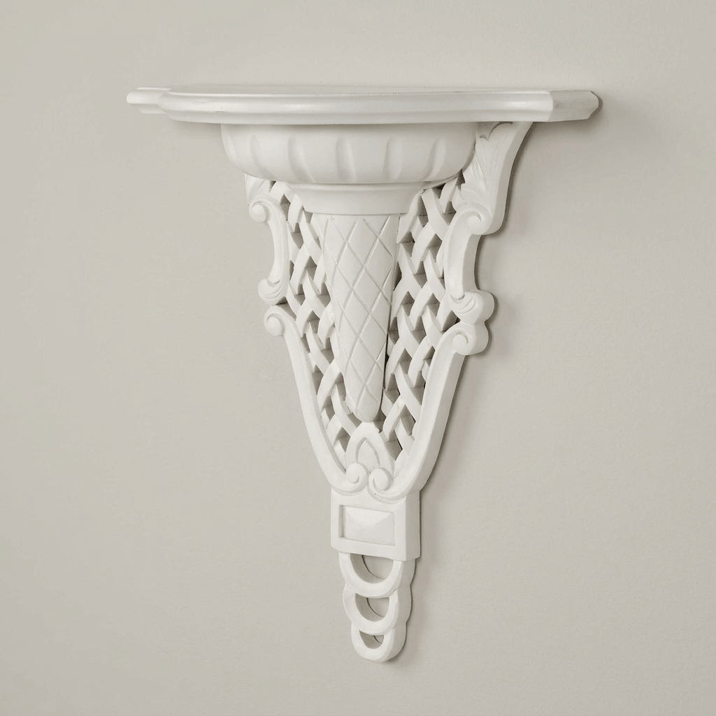 Angled view of white Avelisse Wall Ledge highlighting the curved display surface and carved support.
