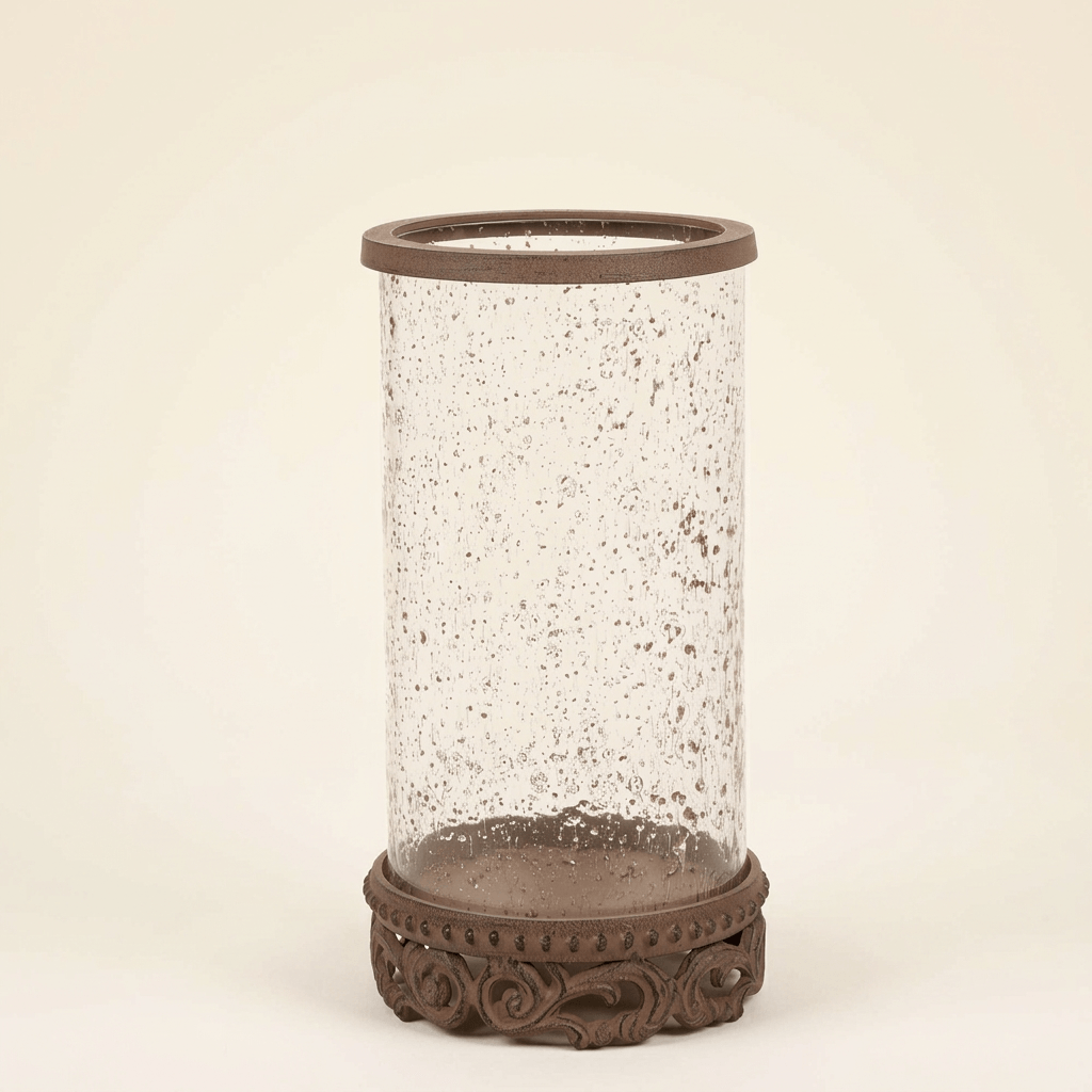 Smaller Bellavita Glass Hurricane Candle Holder with textured glass and brown acanthus base against an ivory studio background.