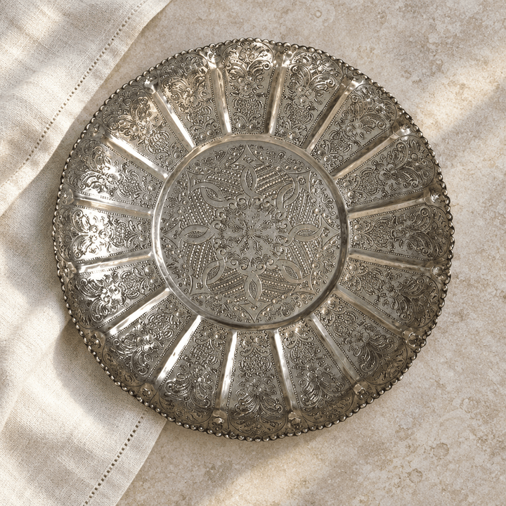 Overhead view of Vintage Moroccan Scalloped Tray showing its engraved pattern and fluted edge