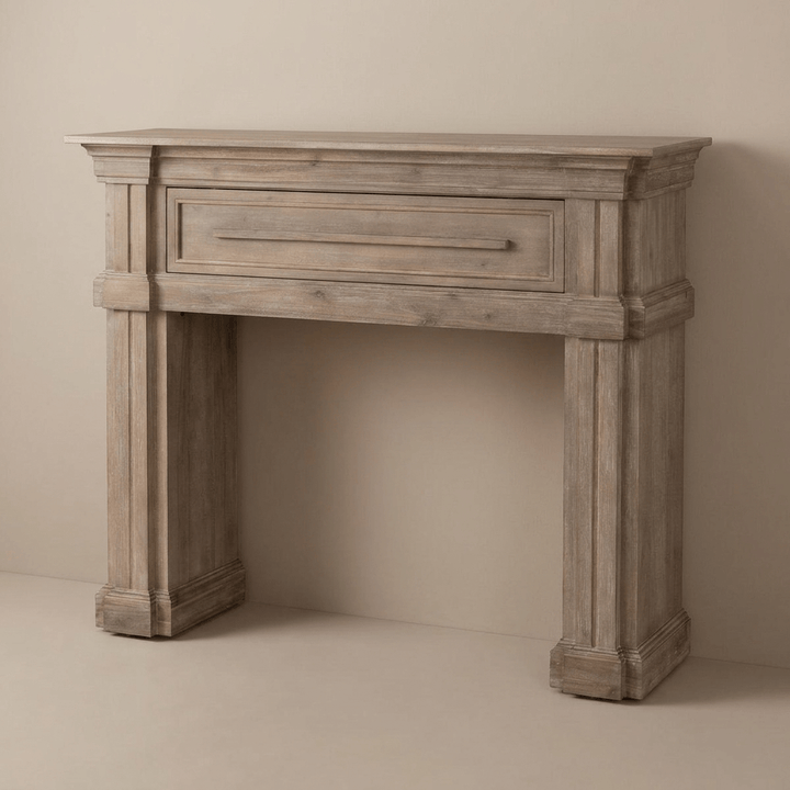 Driftwood decorative mantel with classical pilasters and a closed storage panel, shown with an empty opening.