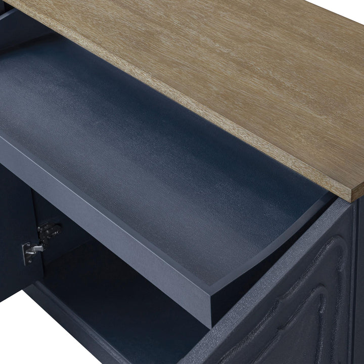 Detail of an extended interior drawer beneath the buffet top.