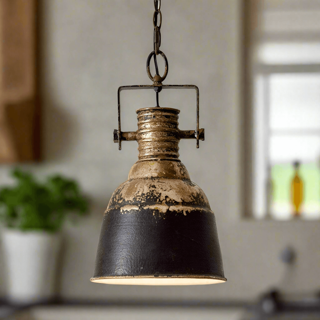 Industrial chic pendant light in distressed metal with vintage charm, ideal for modern interiors.