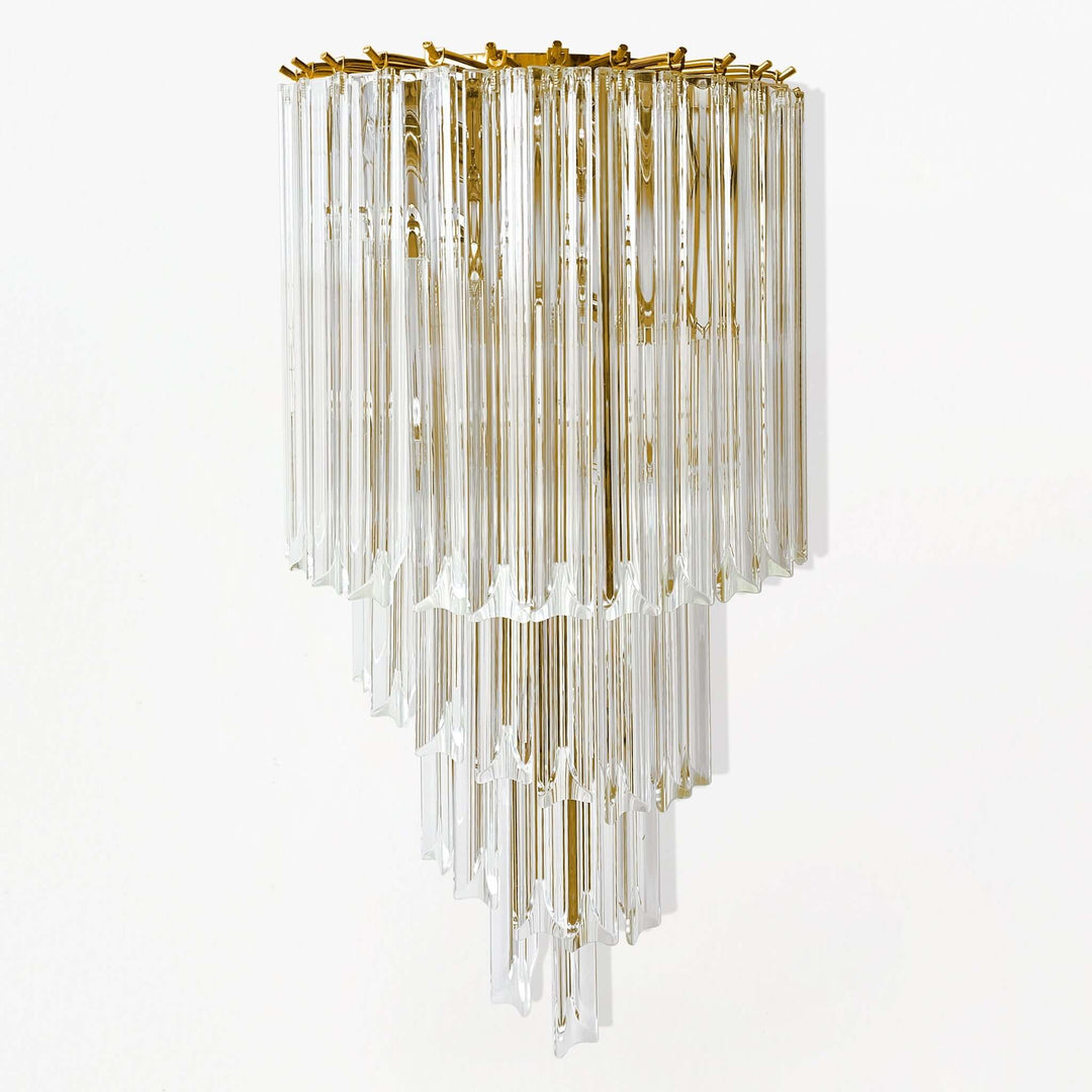 Italian Glass and Polished Brass Wall Sconce with hand-cut prisms radiating vintage glamour and light.
