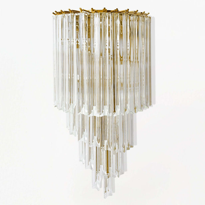 Italian Glass and Polished Brass Wall Sconce with hand-cut prisms radiating vintage glamour and light.