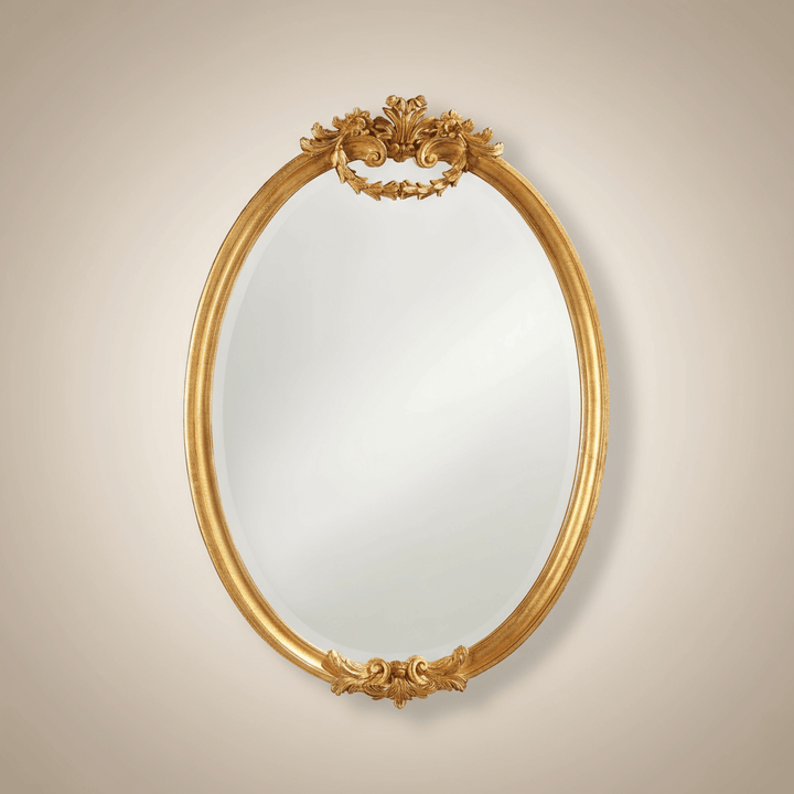 Italian Hand-Carved Gold Leaf Oval Mirror with vintage design, exquisite craftsmanship, and radiant gilded frame.