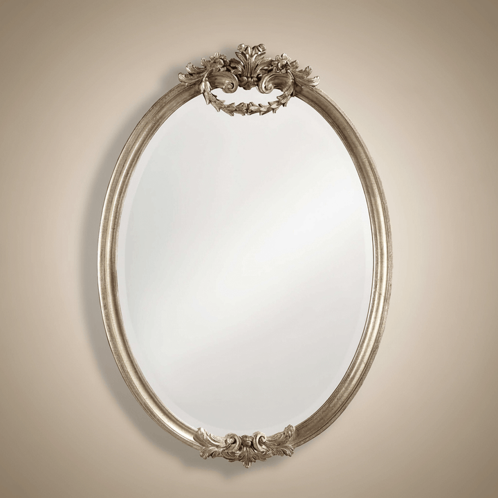 Italian Rococo Silver Oval Wall Mirror with hand-carved wood and antique silver leaf finish, showcasing elegant craftsmanship.