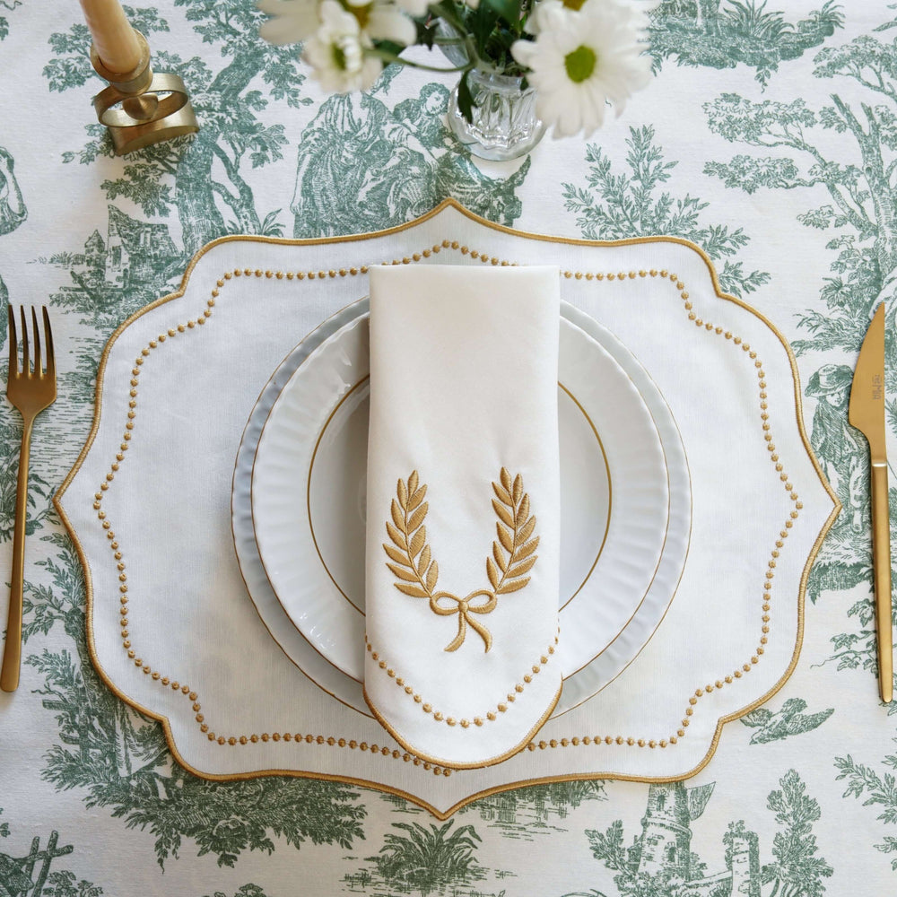 Ivory and Gold Embroidered Placemat and Napkin Set showcasing elegant table setting with vintage glamour.