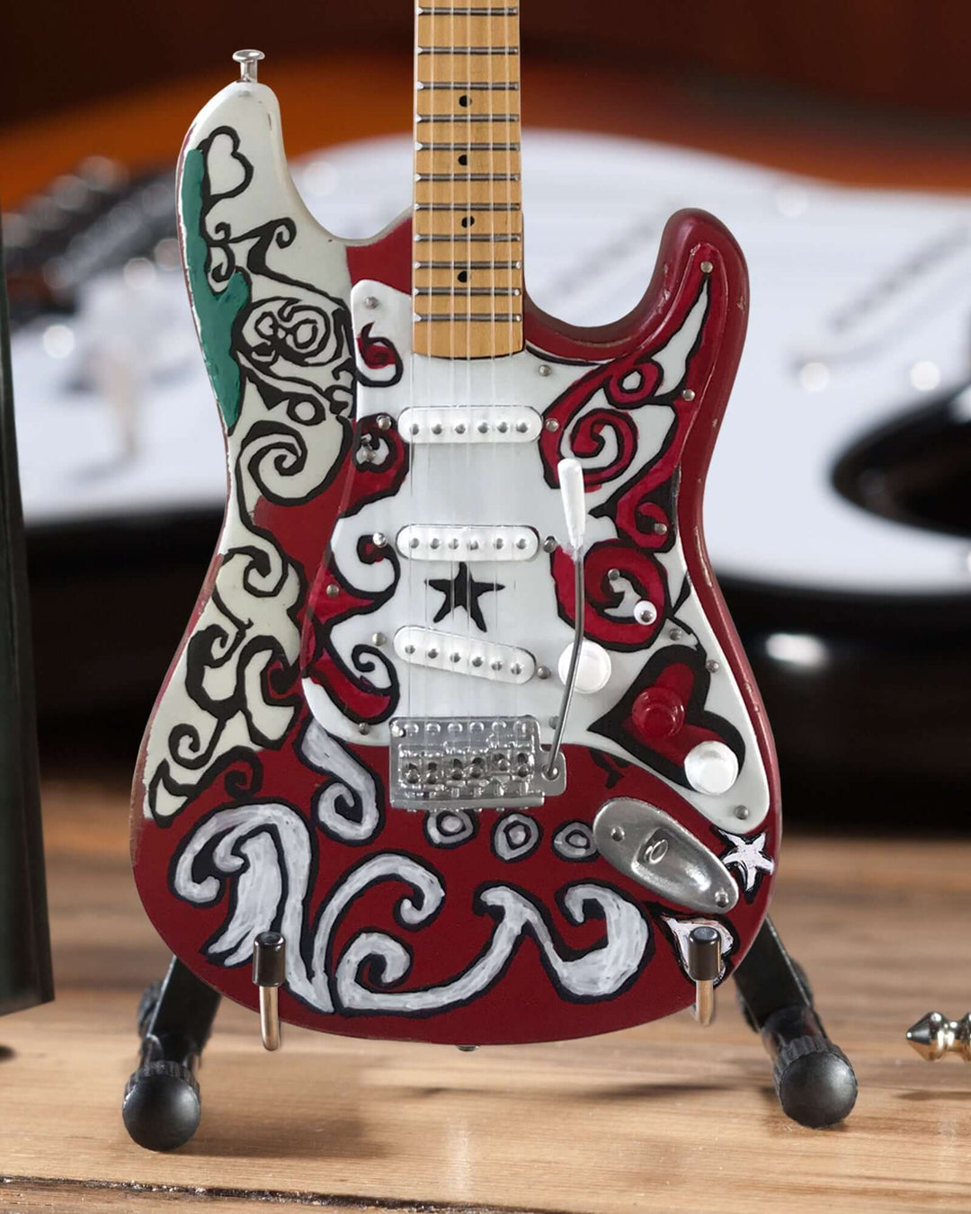 Jimi Hendrix Fender Stratocaster Mini Guitar Replica showcasing intricate artwork and handcrafted details.