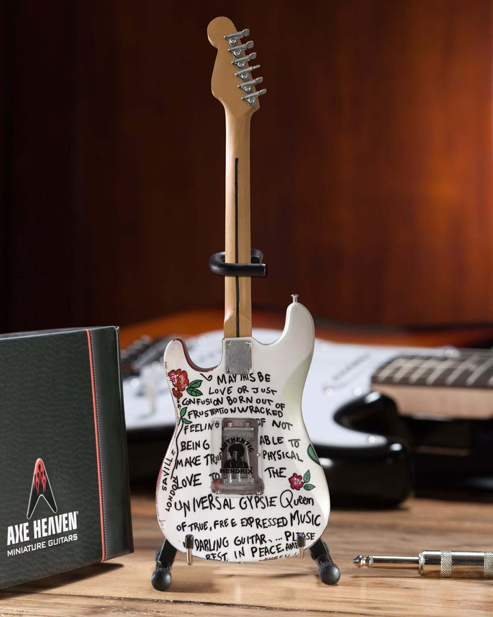 Jimi Hendrix Fender Stratocaster Mini Guitar Replica on display under studio lights, showcasing intricate details and craftsmanship.