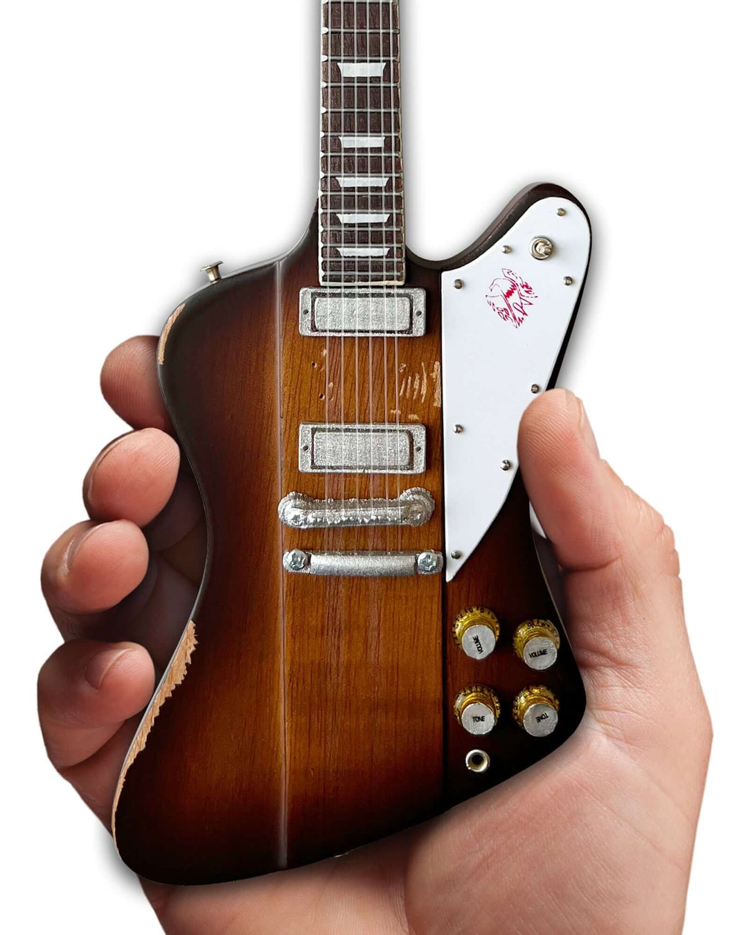 Johnny Winter 1963 Firebird Mini Guitar Replica - Handcrafted scale model in a human hand, honoring a blues-rock icon.