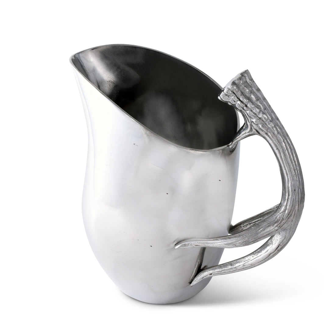 Lodge Style Antler Pitcher with sculptural antler handle in metallic finish, perfect for adding Old World grandeur to your table setting.