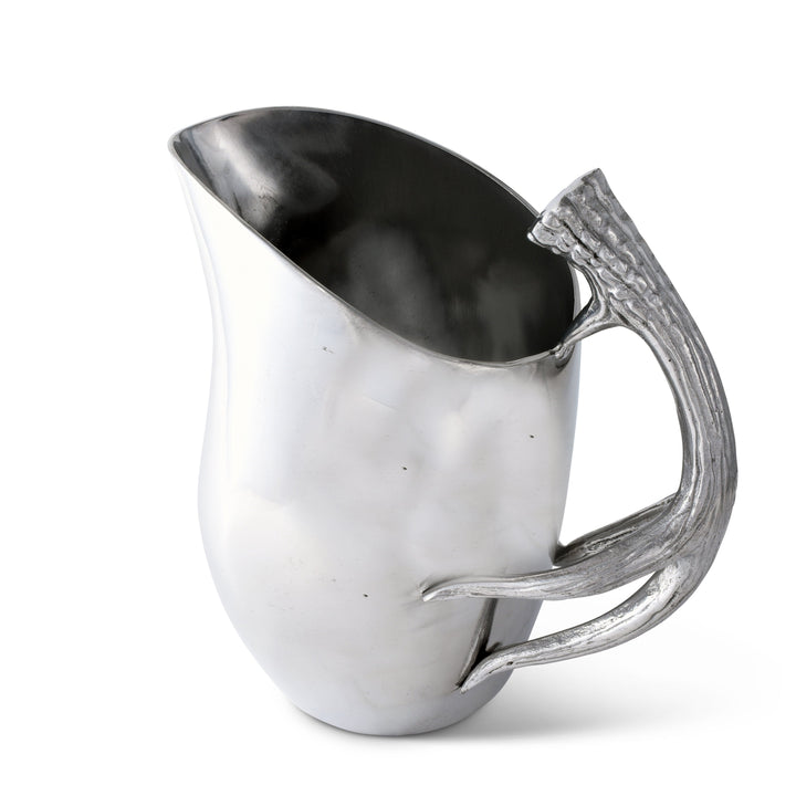 Lodge Style Antler Pitcher with sculptural antler handle in metallic finish, perfect for adding Old World grandeur to your table setting.
