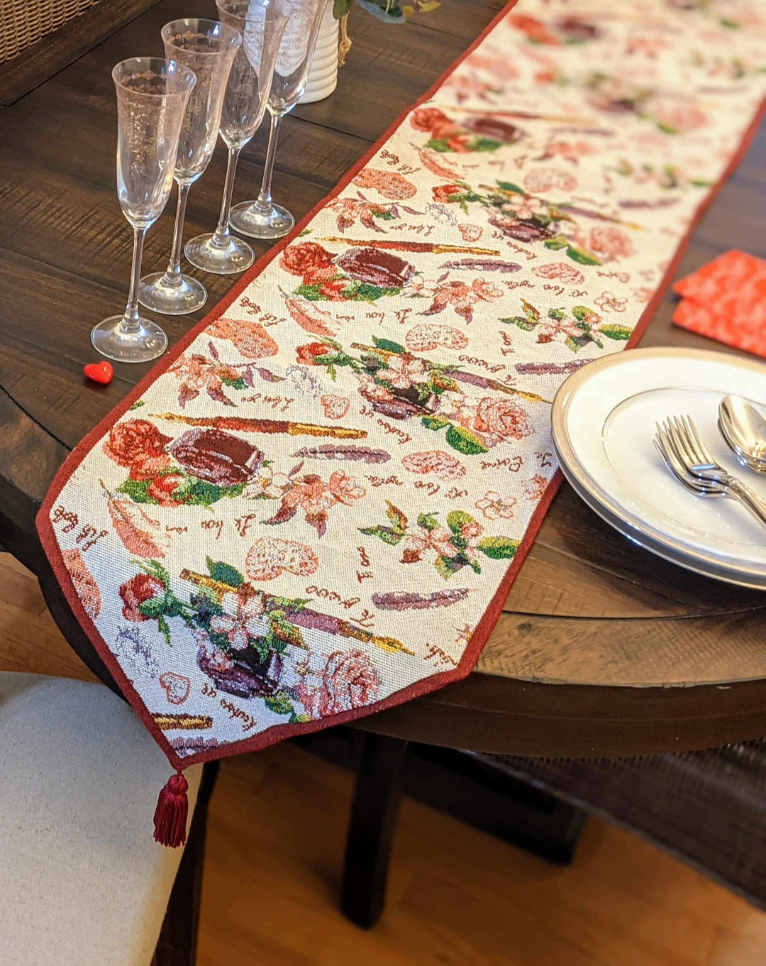 Elegant DaDa Bedding Sweet Heart Love Notes Pink Floral Woven Tapestry Dining Table Runner (18273) on a wooden table with glassware.