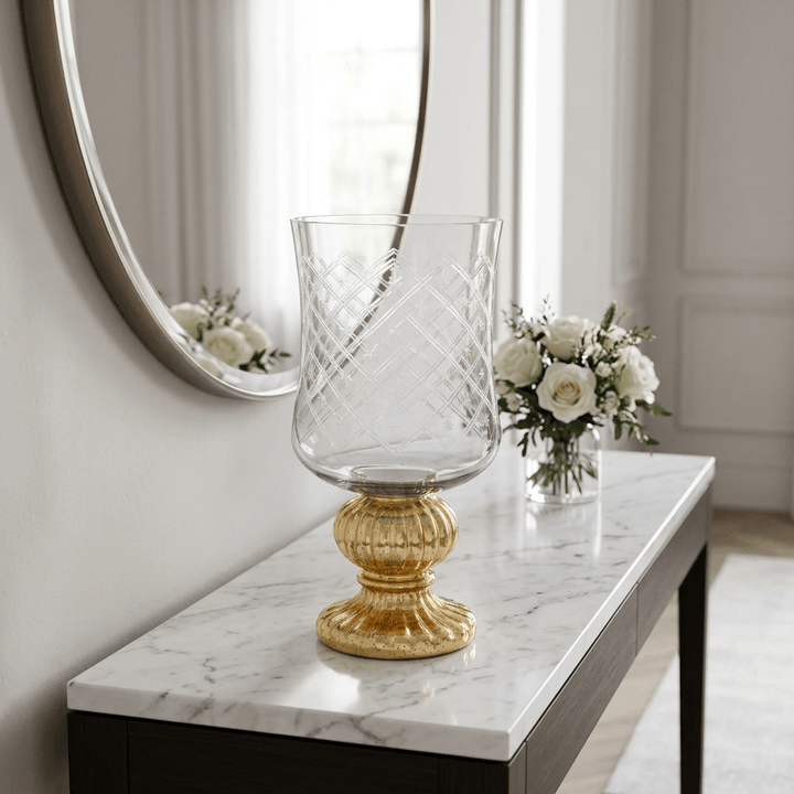 Marielle Diamond Glass Candle Holder with Gold Mercury Pedestal on a marble entry console