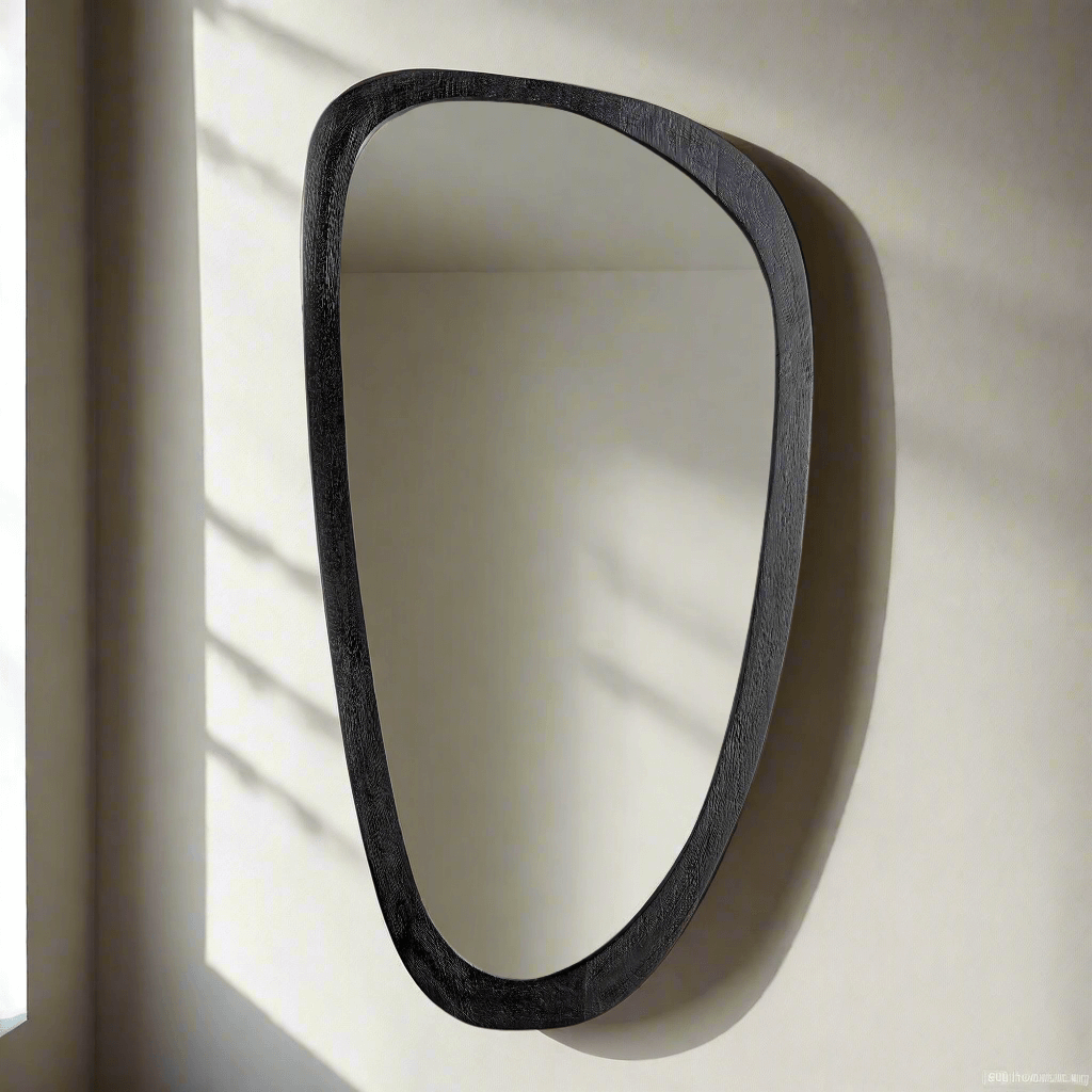 Asymmetrical black wood mirror with a sculptural design, embodying mid-century modern style.