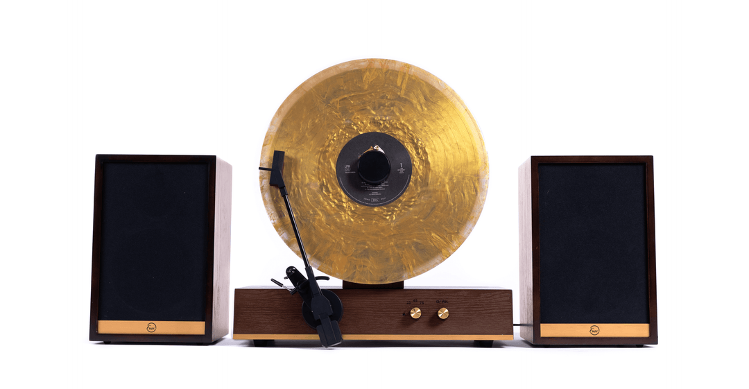 Turntable with two speakers on a white background