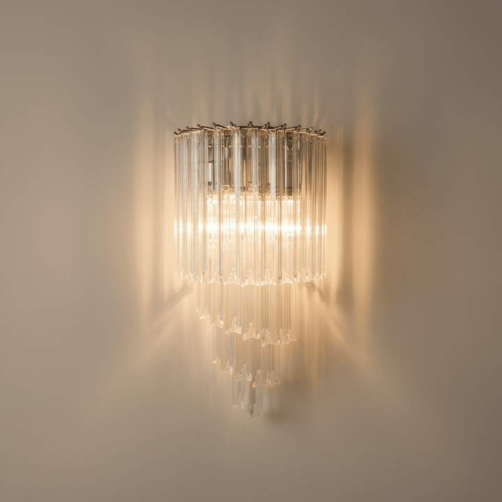 Italian Tiered Glass and Polished Nickel Wall Sconce with cascading crystal prisms illuminating a room with elegance and style