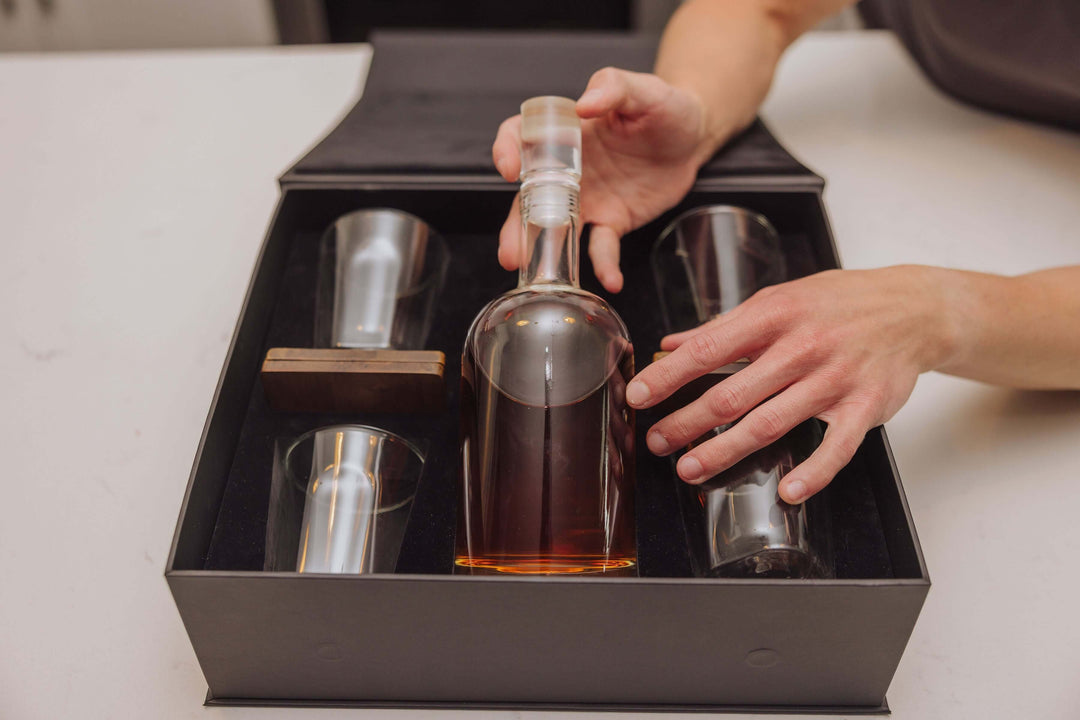 Old World Whiskey Decanter and Glass Set in Faux Leather Case being displayed in an open box