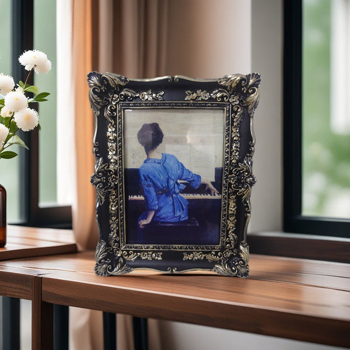 Black Ornate Baroque Picture Frame displaying a piano portrait