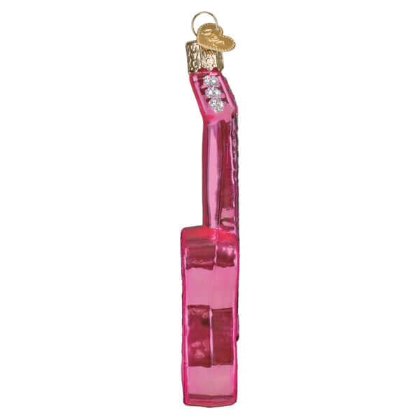 Pink Glitter Guitar Christmas Ornament against white background, showcasing vibrant pink sparkle and handcrafted glass details for festive decor.