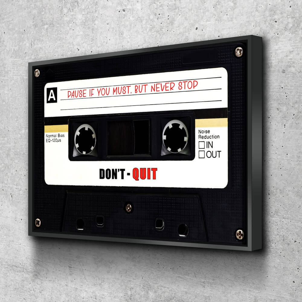 Retro Cassette Tape Motivational Wall Art featuring a cassette design with 'Pause if you must, but never stop' inspirational quote