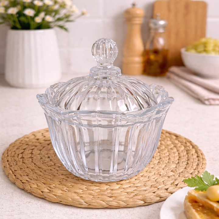 Ribbed Crystal Candy Dish with Domed Lid on a woven placemat