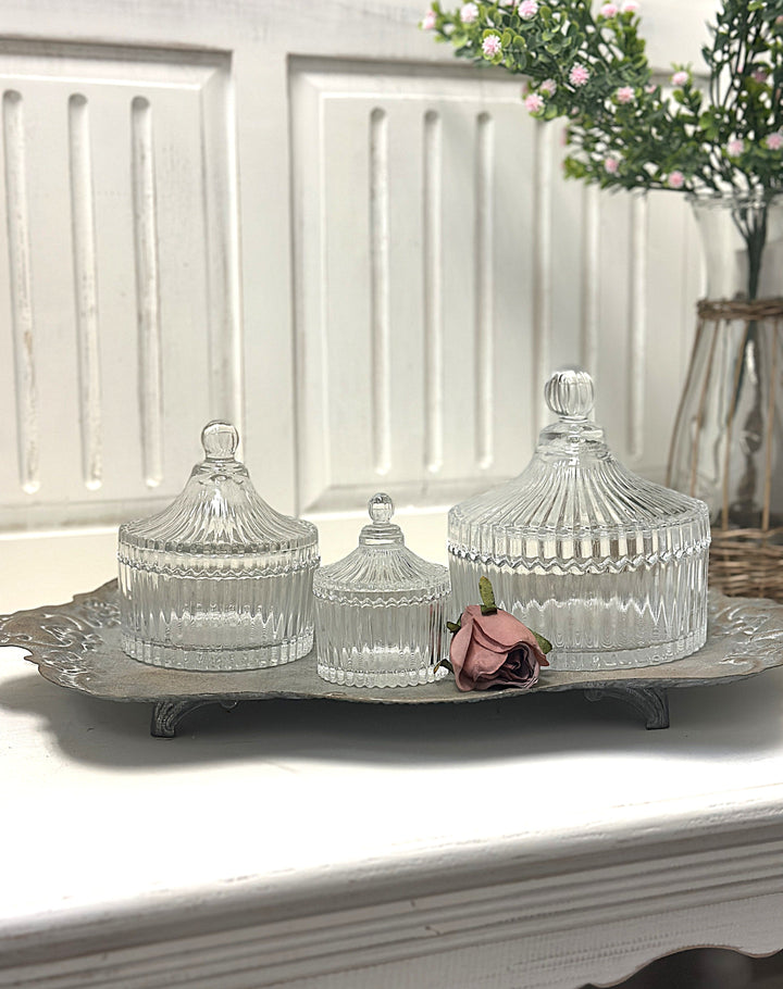 Ribbed Glass Storage Jars with Lids displayed in three graduated sizes