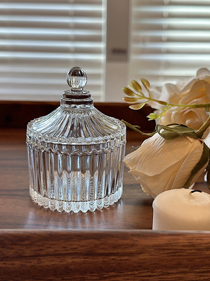 Ribbed Glass Storage Jars with Lids styled on a light tabletop