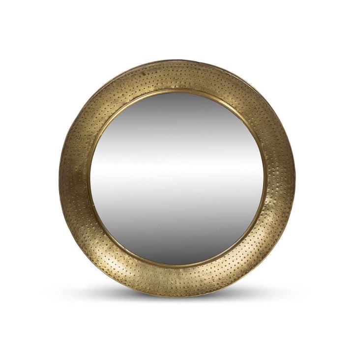 Vintage round hammered brass wall mirror with iron porthole design, elegant and timeless home decor accent.