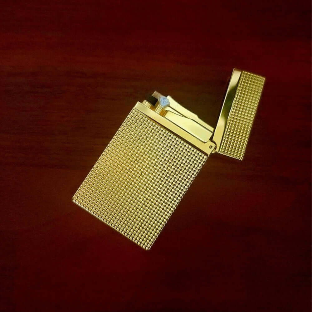 The Royale Handcrafted Solid Brass Lighter by Jacob Bromwell, showcasing luxurious design and craftsmanship.