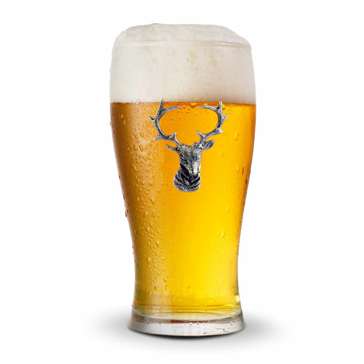 Glass of beer with a deer head logo on a white background