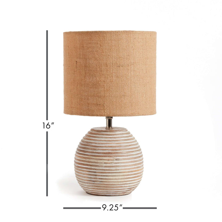 Rustic mango wood table lamp with linen shade, textured design and dimensions 16 inches tall, 9.25 inches wide.