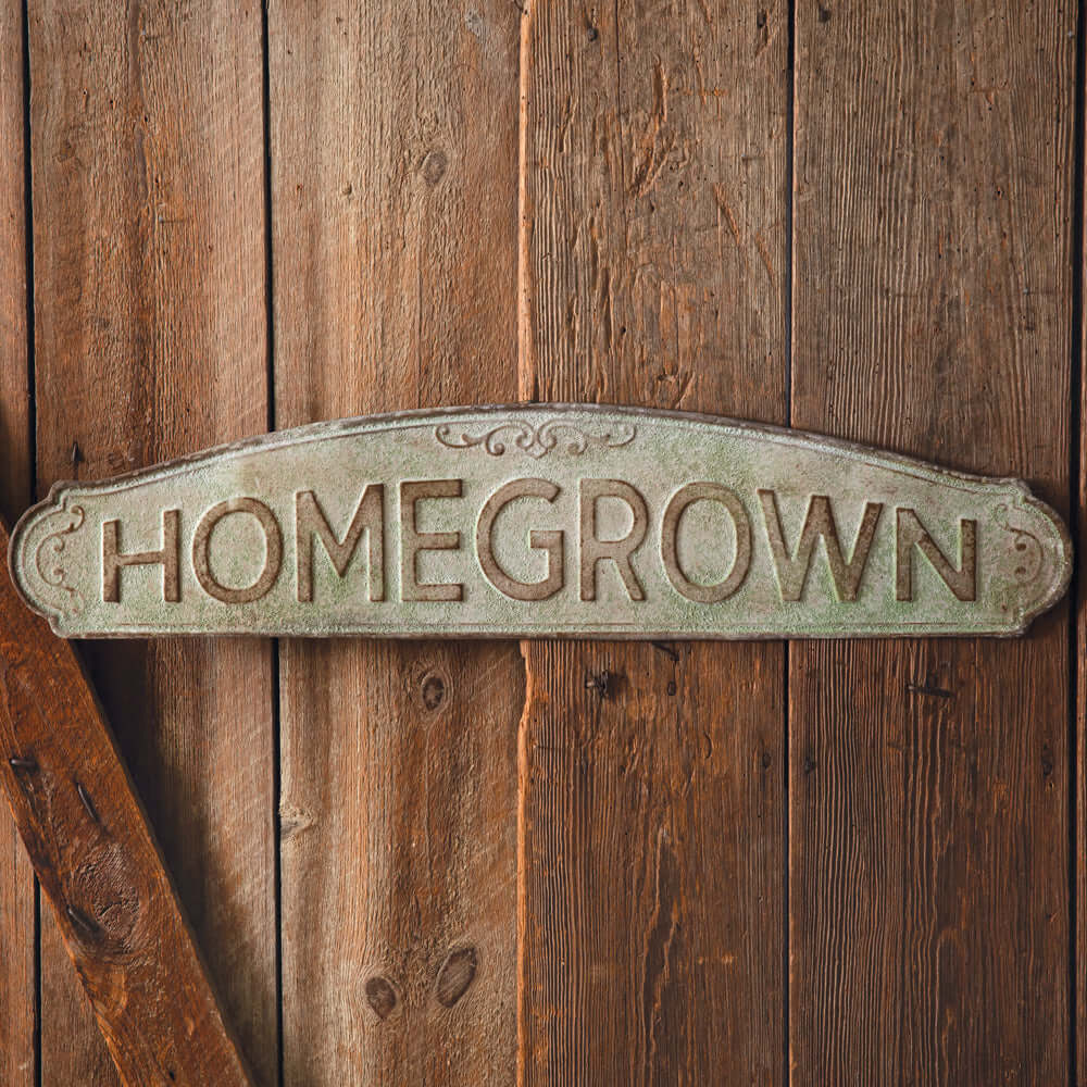Rustic Metal “Homegrown” Wall Sign with a vintage green finish, ideal for farmhouse decor and vintage interior styling.