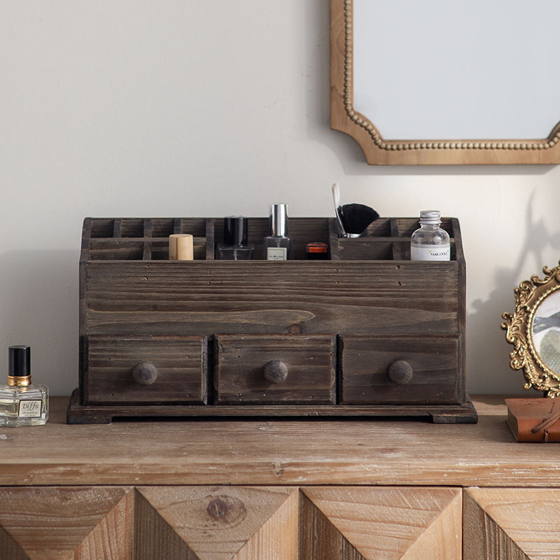 Front view of the organizer with divided compartments and three drawers