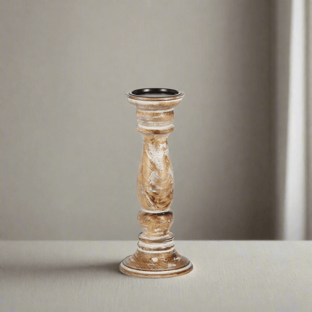 Rustic farmhouse whitewashed wood candle holder on a table, featuring a vintage look with hand-distressed mango wood grain design.